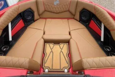 Slide: The Image of 2026 Tigé Z3 boat interior with tan seating and modern design. - 8