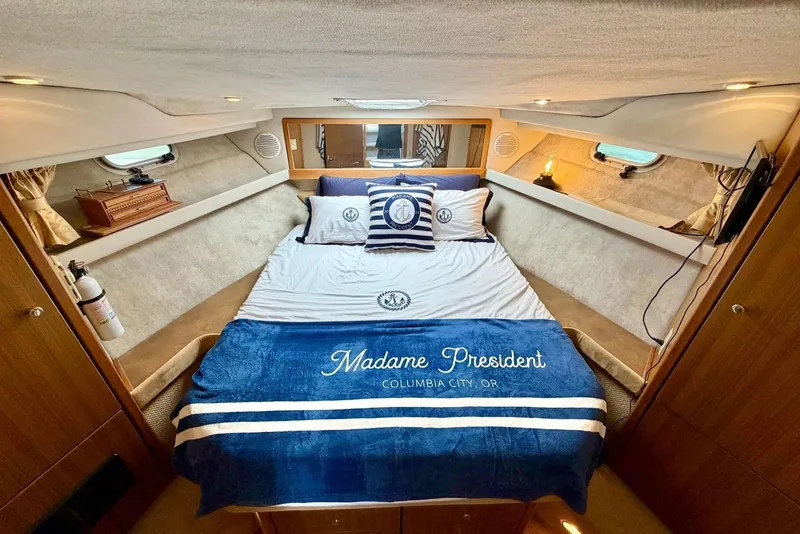 Slide: The Image of Luxurious bedroom in 2002 Bayliner 3988 Command Bridge Motoryacht with elegant bedding. - 17