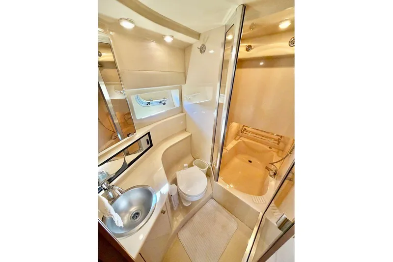 Slide: The Image of Luxurious bathroom in 2002 Bayliner 3988 Command Bridge Motoryacht with shower and sink. - 18