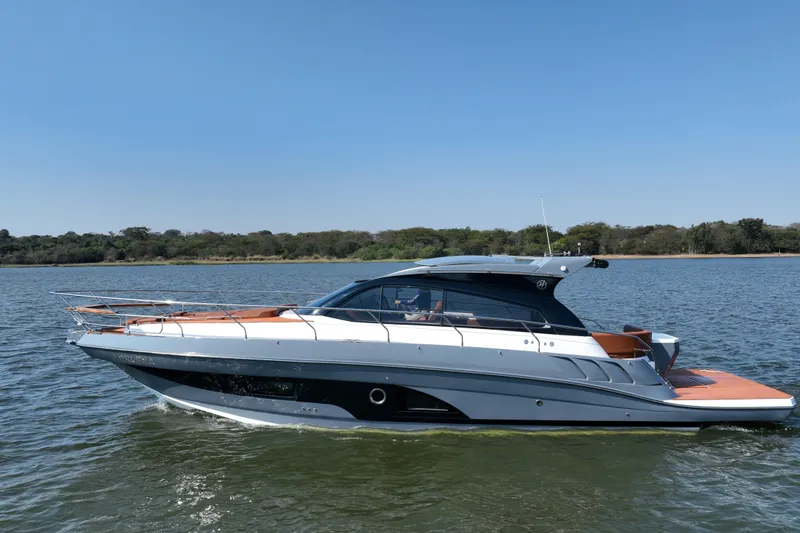 The Image of Luxury Hanover 415 yacht cruising on a serene lake, 2026 model. - 0