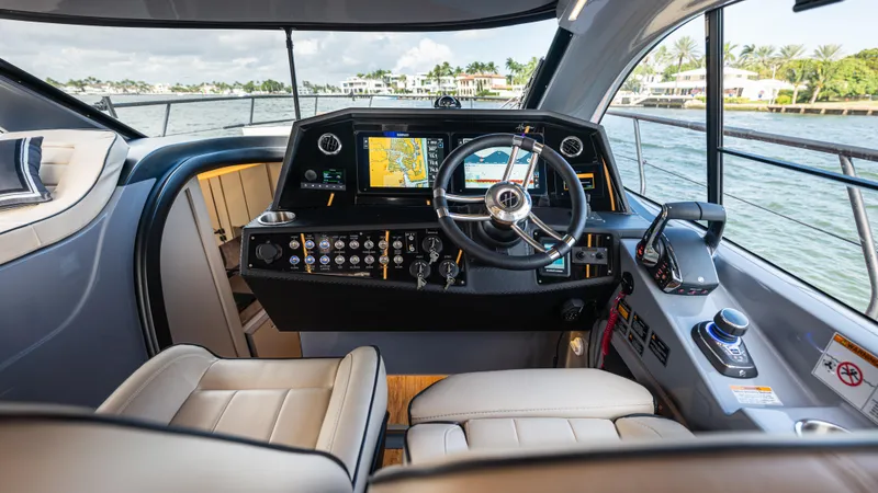 Slide: The Image of Interior of Hanover 415 boat, 2026 model, featuring modern helm console. - 48