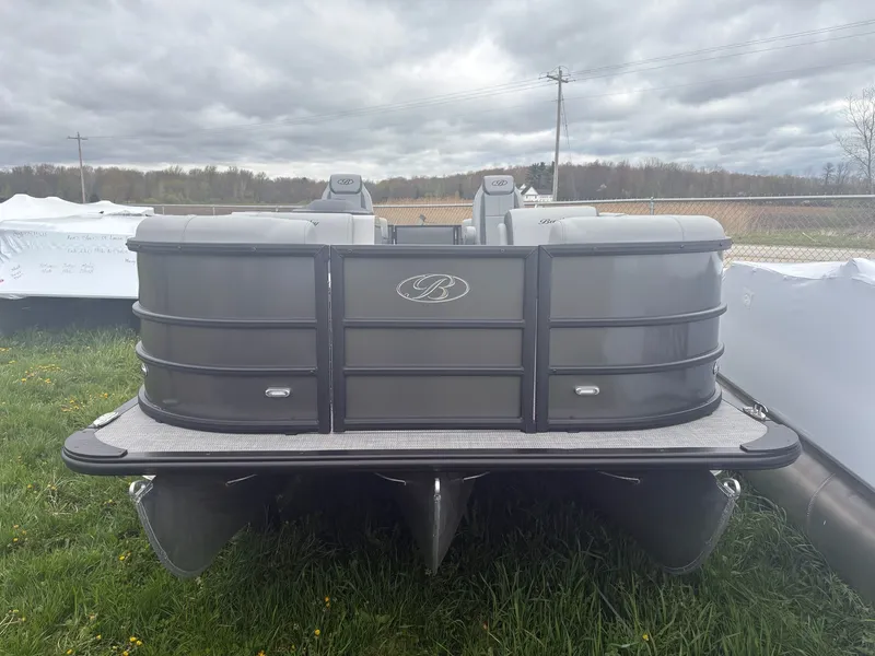 The Image of 2026 Bentley Pontoons LEGACY 223 NAVIGATOR TRI-TOON parked on grass. - 1