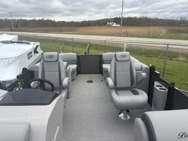 Slide: The Image of 2026 Bentley Pontoons LEGACY 223 NAVIGATOR TRI-TOON interior with gray seating. - 4
