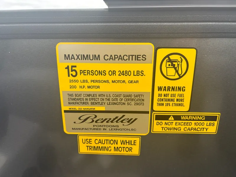 Slide: The Image of Safety labels on Bentley Pontoons LEGACY 223 NAVIGATOR TRI-TOON 2026. - 8