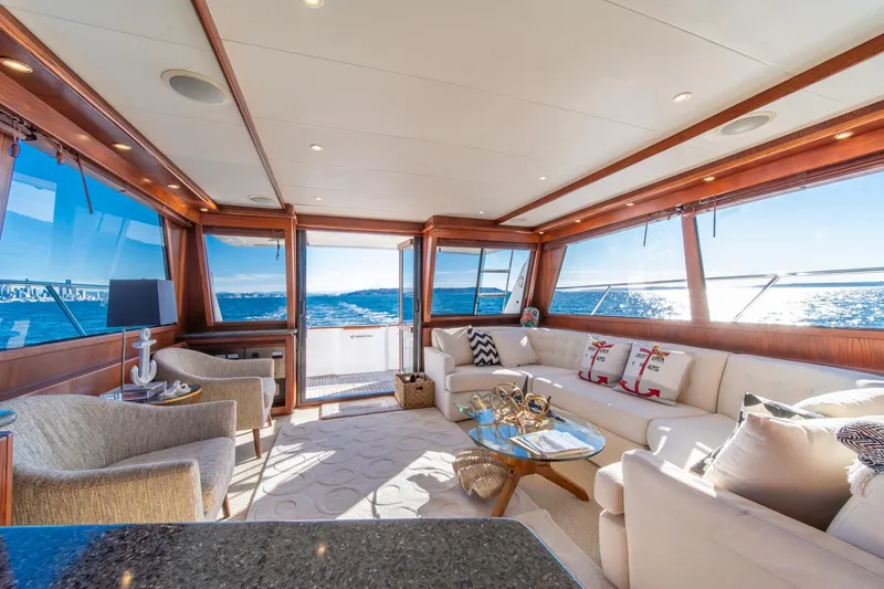 Slide: The Image of Luxurious interior of 1998 West Bay 58 Sonship Pilothouse yacht with ocean view. - 17
