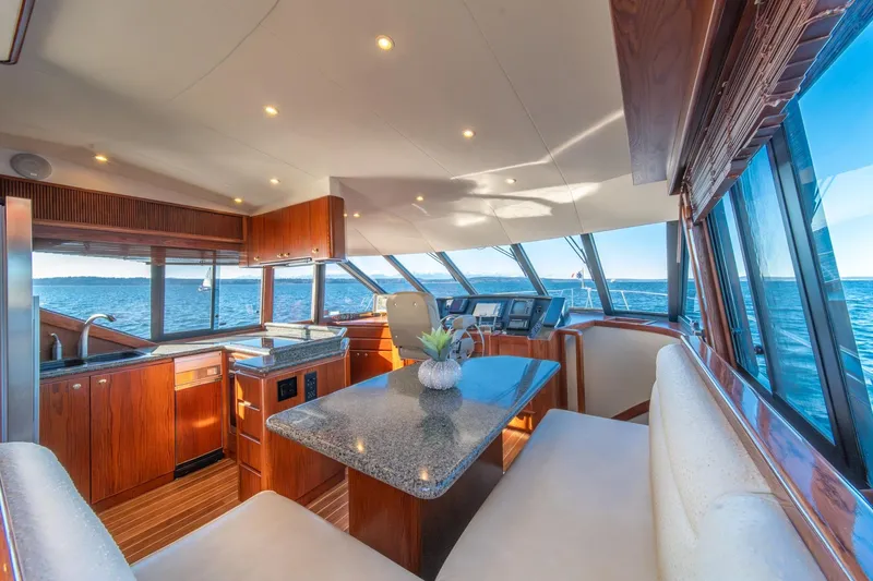 Slide: The Image of Luxurious interior of 1998 West Bay 58 Sonship Pilothouse MY yacht with ocean view. - 21