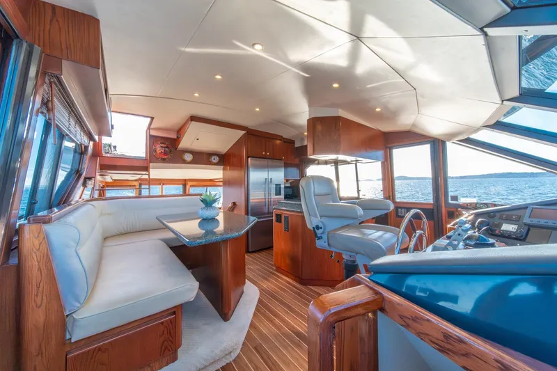 Slide: The Image of Luxurious 1998 West Bay 58 Sonship Pilothouse MY interior with elegant seating and panoramic views. - 22