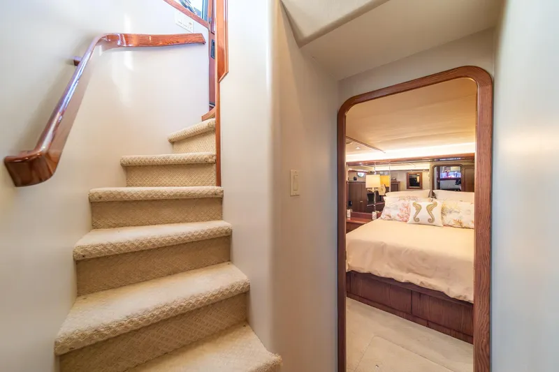 Slide: The Image of Staircase and bedroom interior of 1998 West Bay 58 Sonship Pilothouse MY yacht. - 29
