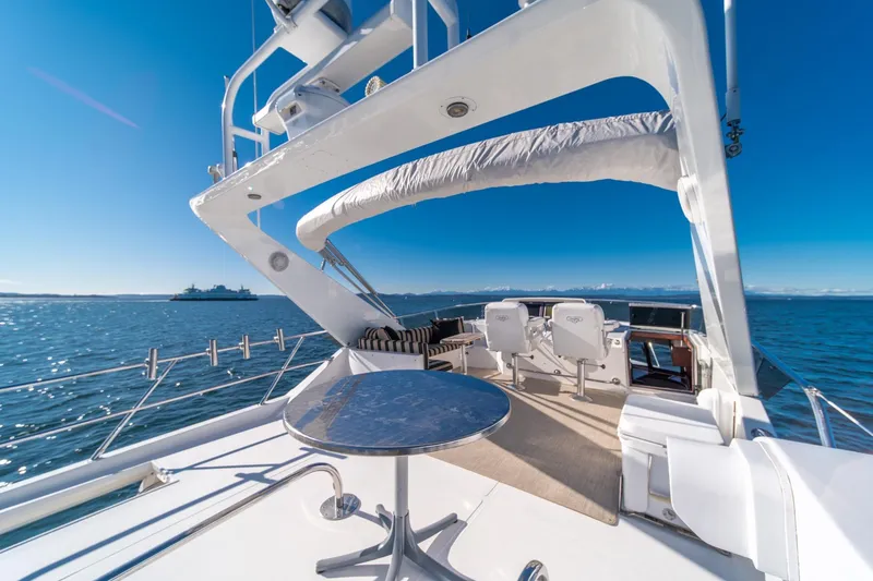 Slide: The Image of Luxurious 1998 West Bay 58 Sonship Pilothouse yacht deck with ocean view. - 47