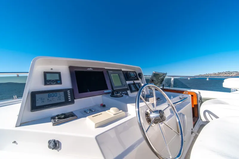 Slide: The Image of Cockpit of 1998 West Bay 58 Sonship Pilothouse MY with navigation instruments and steering wheel. - 53