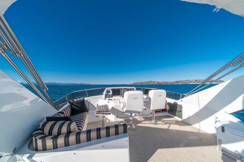 Slide: The Image of Luxurious 1998 West Bay 58 Sonship Pilothouse MY yacht with elegant seating and ocean view. - 54