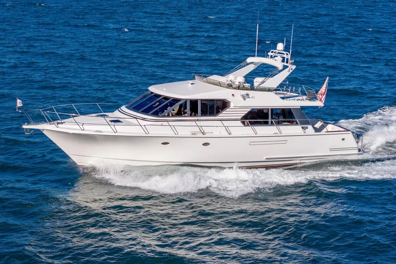 Slide: The Image of 1998 West Bay 58 Sonship Pilothouse MY cruising on open water. - 7