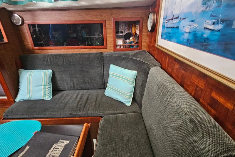 Slide: The Image of Interior of 1979 CSY 44 CC yacht with cozy seating and nautical decor. - 28