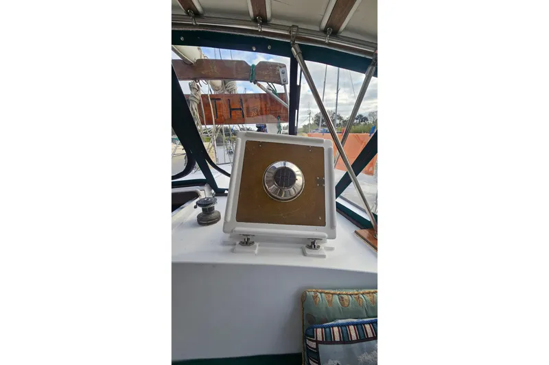Slide: The Image of 1979 CSY 44 CC sailboat cockpit with compass and seating. - 40