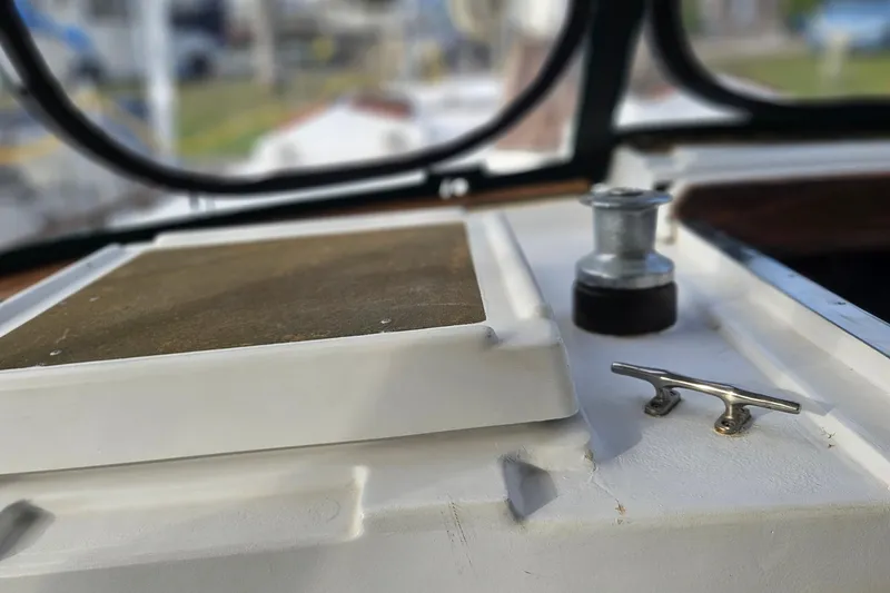 Slide: The Image of 1979 CSY 44 CC yacht deck with winch and cleat details. - 43