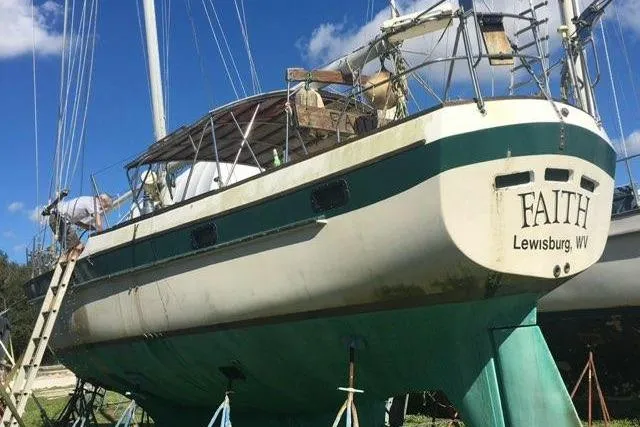 Slide: The Image of 1979 CSY 44 CC sailboat named "Faith" on land in Lewisburg, WV. - 54