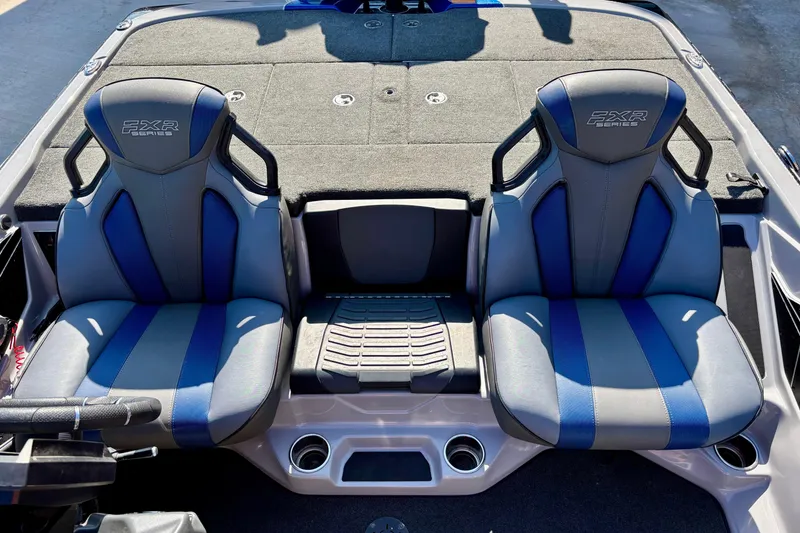 Slide: The Image of 2021 Skeeter FXR21 boat interior with two blue and gray seats. - 5