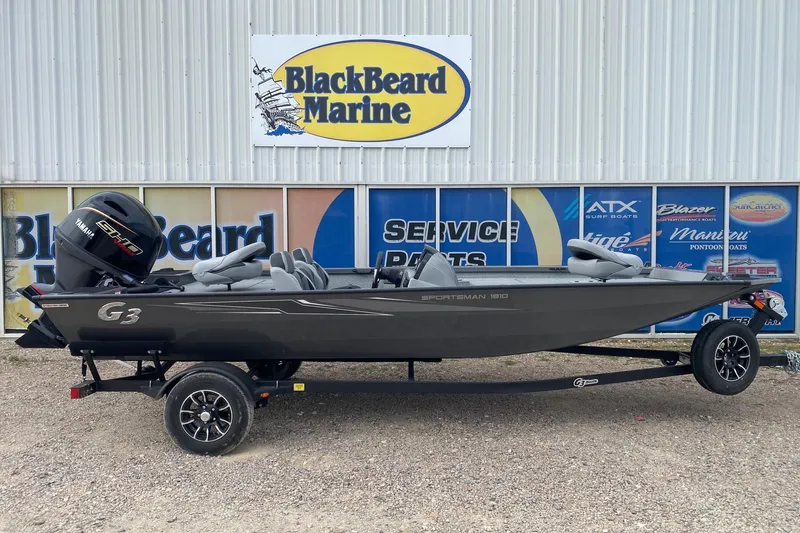 The Image of 2026 G3 Sportsman 1810 PFX boat on trailer at BlackBeard Marine dealership. - 1