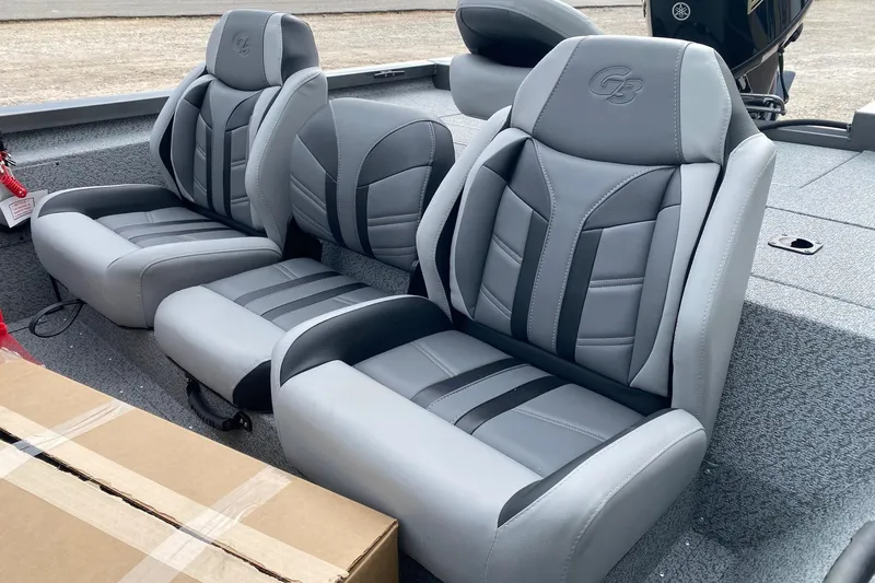 Slide: The Image of 2026 G3 Sportsman 1810 PFX boat seats, featuring sleek gray and black design. - 10