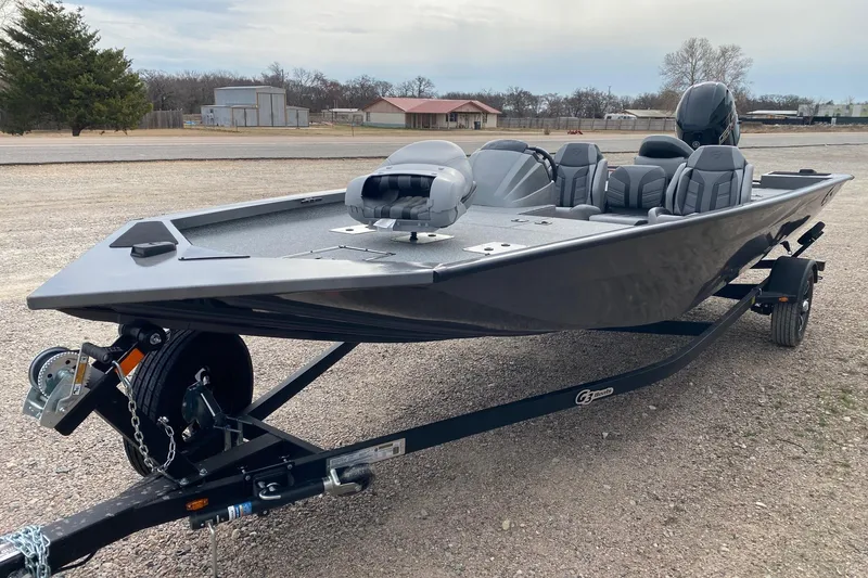 Slide: The Image of 2026 G3 Sportsman 1810 PFX boat on trailer, parked outdoors. - 3