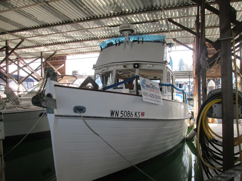 The Image of 1966 Grand Banks 32 Sedan in covered marina. - 1