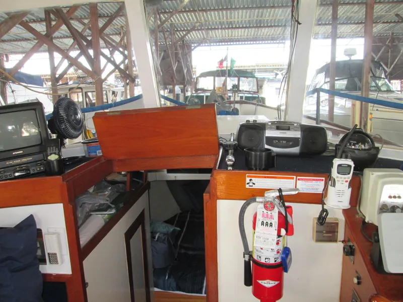 Slide: The Image of Interior of a 1966 Grand Banks 32 Sedan with electronics. - 14