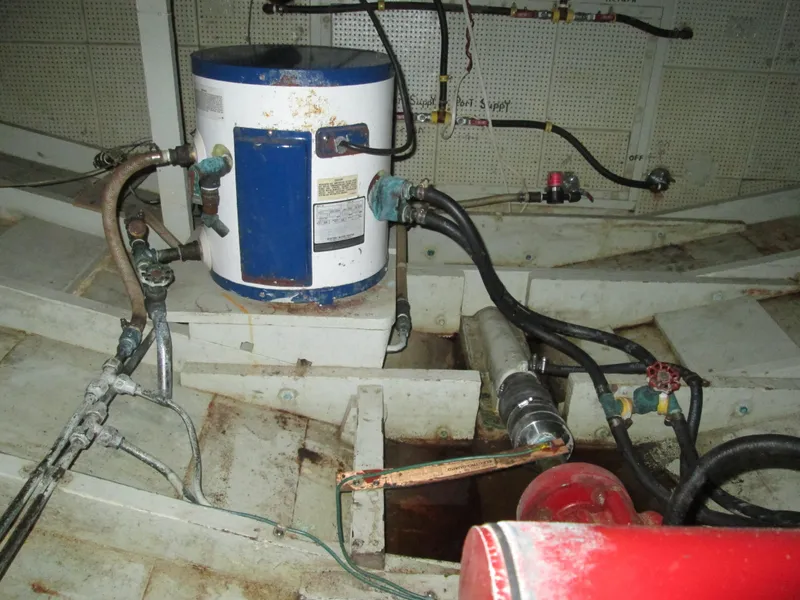 Slide: The Image of Interior of a 1966 Grand Banks 32 Sedan boat with piping. - 24