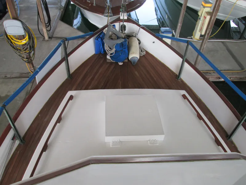 Slide: The Image of Deck of a 1966 Grand Banks 32 Sedan boat in harbor. - 6