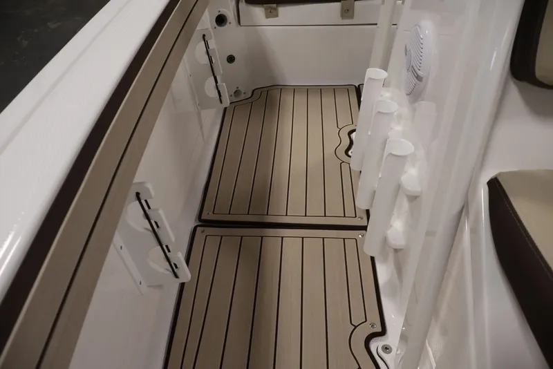 Slide: The Image of Interior view of 2026 Yamaha Boats 195 FSH Sport, featuring sleek deck design. - 22
