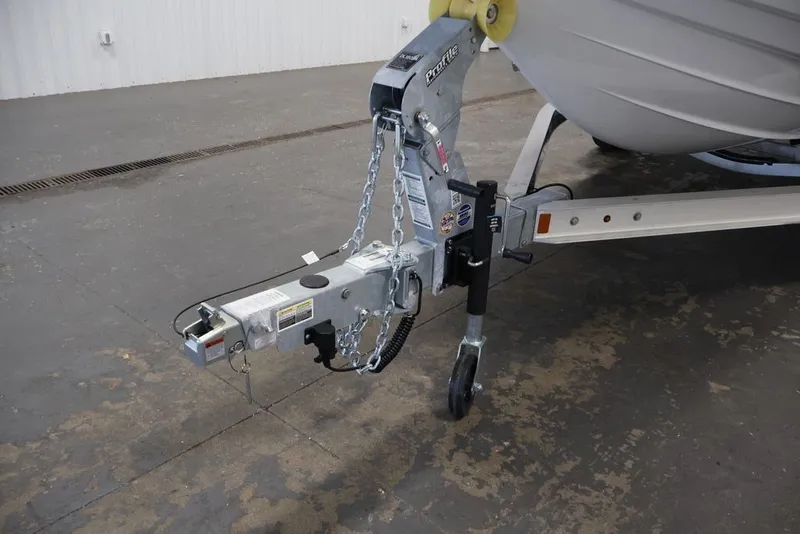 Slide: The Image of Trailer hitch of 2026 Yamaha Boats 195 FSH Sport on concrete floor. - 31