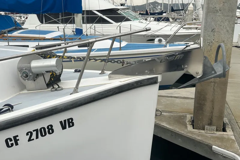 Slide: The Image of Bow of a 1999 Samson East Coast Lobster boat docked at a marina. - 14
