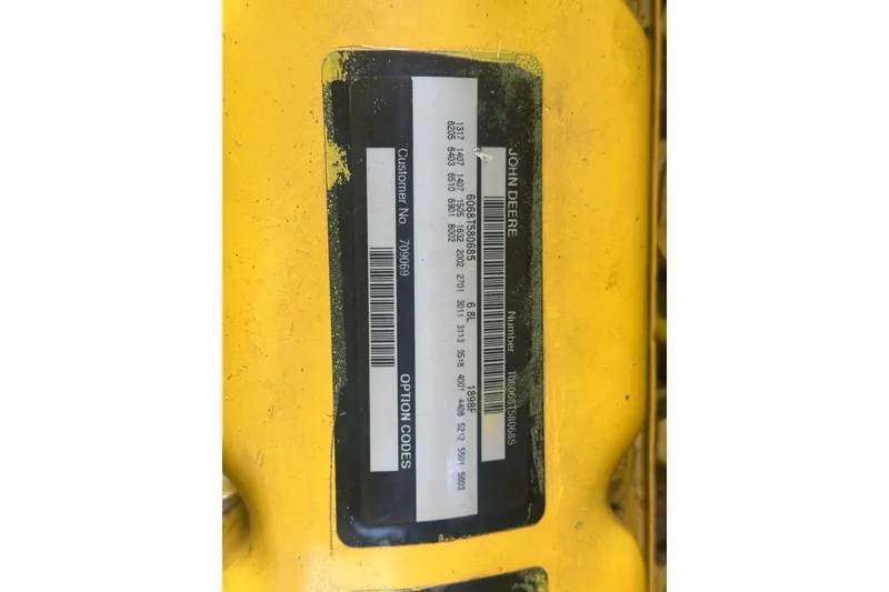 Slide: The Image of Yellow machinery with John Deere label, Samson East Coast Lobster 1999 model. - 17