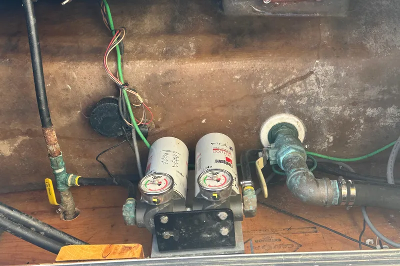 Slide: The Image of Boat engine compartment with gauges and pipes, Samson East Coast Lobster 1999 model. - 22