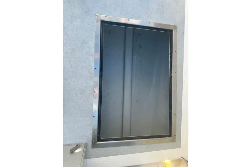 Slide: The Image of Metal-framed window on Samson East Coast Lobster boat, 1999 model. - 23