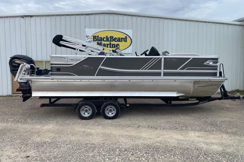 The Image of 2026 SunCatcher Diamond Elite 324 SS pontoon boat on trailer at BlackBeard Marine. - 1