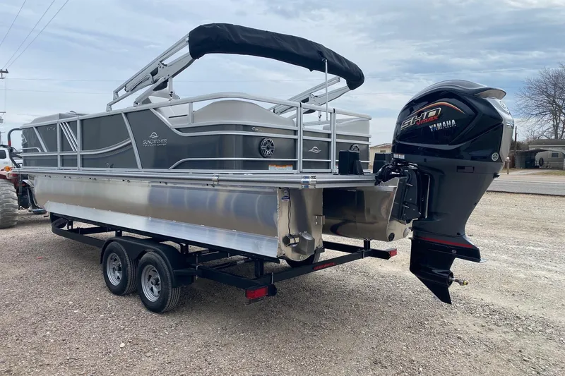 Slide: The Image of 2026 SunCatcher Diamond Elite 324 SS pontoon boat with Yamaha motor on trailer. - 4