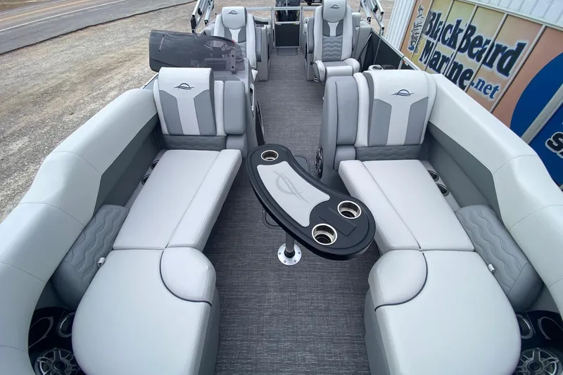 Slide: The Image of Luxurious interior of 2026 SunCatcher Diamond Elite 324 SS pontoon boat with plush seating. - 7