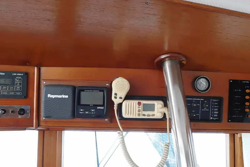 Slide: The Image of Control panel of a 1986 Grand Banks 46 Classic yacht with navigation equipment. - 6