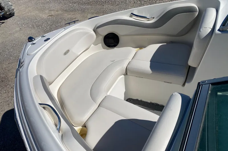 Slide: The Image of 2007 Chaparral 190 SSi boat interior with white seating and sleek design. - 11