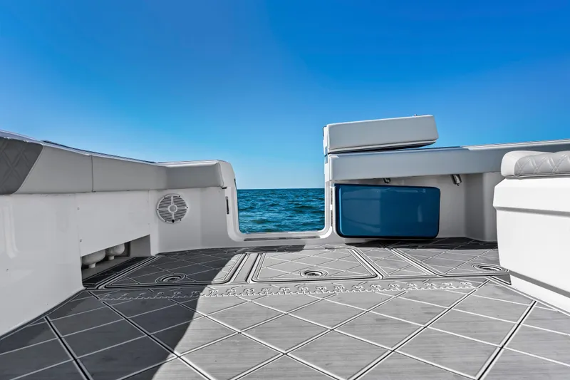 Slide: The Image of 2024 Invincible 46 Catamaran deck with ocean view and blue sky. - 27