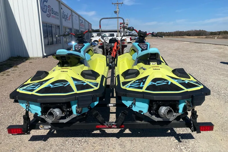Slide: The Image of 2025 Yamaha WaveRunner JetBlaster jet skis on trailer, parked outside dealership. - 6