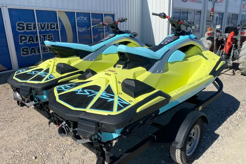 Slide: The Image of 2025 Yamaha WaveRunner JetBlaster in vibrant yellow and blue on a trailer. - 7