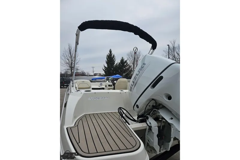Slide: The Image of 2022 Stingray 182 SC boat with Suzuki outboard motor, rear view. - 26