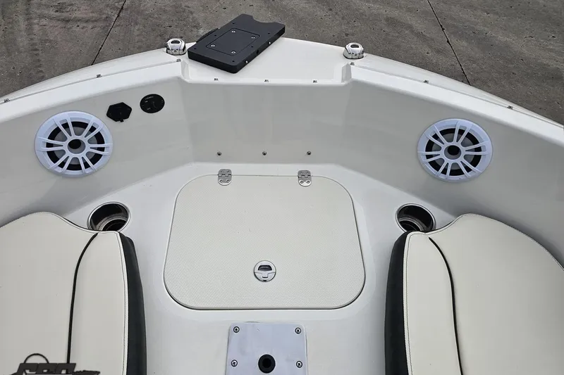 Slide: The Image of 2022 Stingray 182 SC boat interior with speakers and seating. - 71