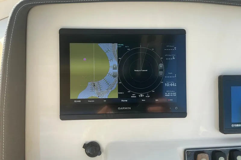 Slide: The Image of Garmin navigation display on 2020 Grady-White Freedom 275 boat dashboard. - 17