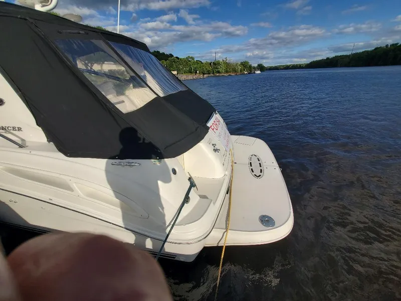 Slide: The Image of 2004 Sea Ray 360 Sundancer on water, sunny day. - 5