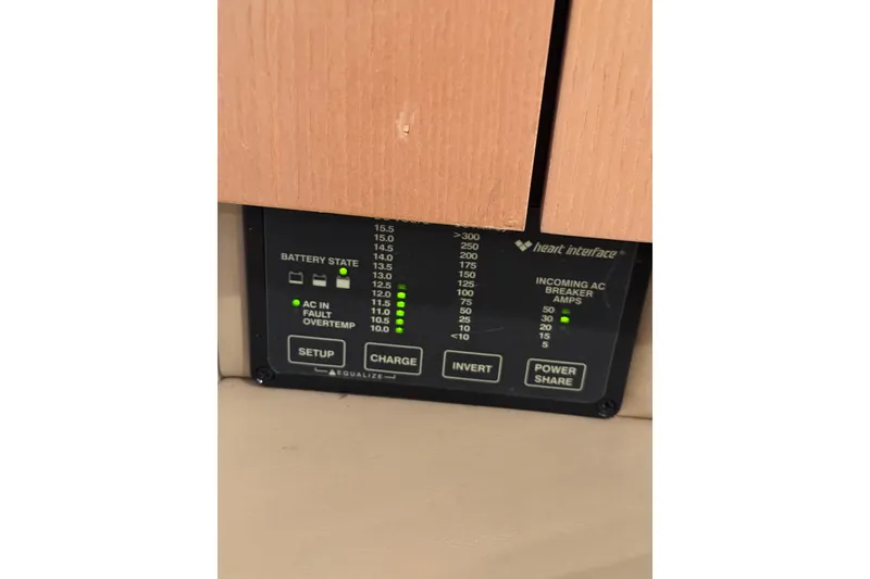 Slide: The Image of Control panel of a 1998 Bayliner 3685 Avanti Sunbridge boat, showing battery state indicators. - 13