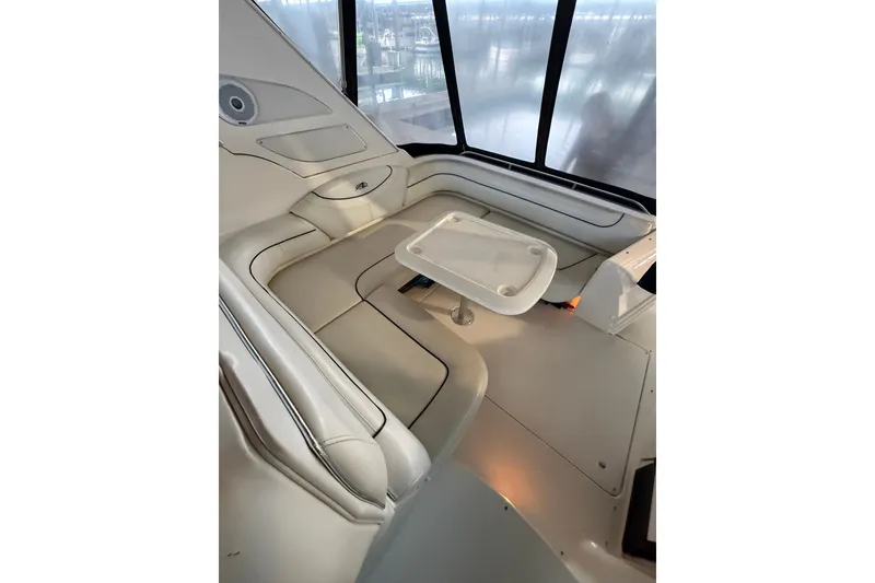 Slide: The Image of Interior of 1998 Bayliner 3685 Avanti Sunbridge with seating and table. - 16