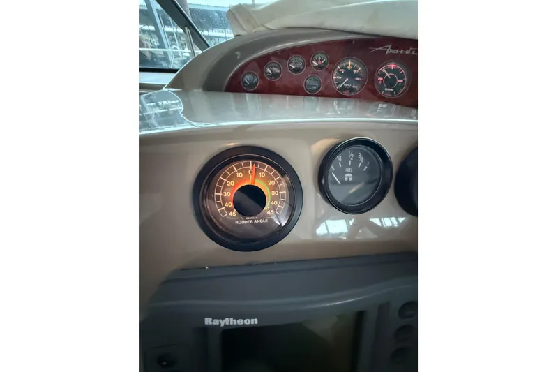 Slide: The Image of Instrument panel of 1998 Bayliner 3685 Avanti Sunbridge with rudder angle gauge. - 36