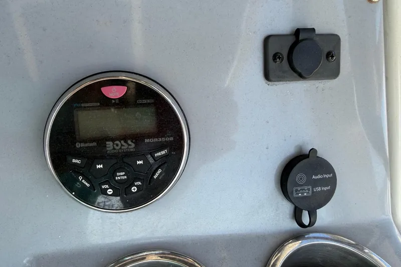 Slide: The Image of Close-up of a 2022 2 Bar T22 CX audio system with USB and audio inputs. - 13